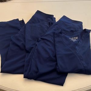 Scrubology Women’s set of Navy Scrubs Top size S pants size SP 1 top 2 pants